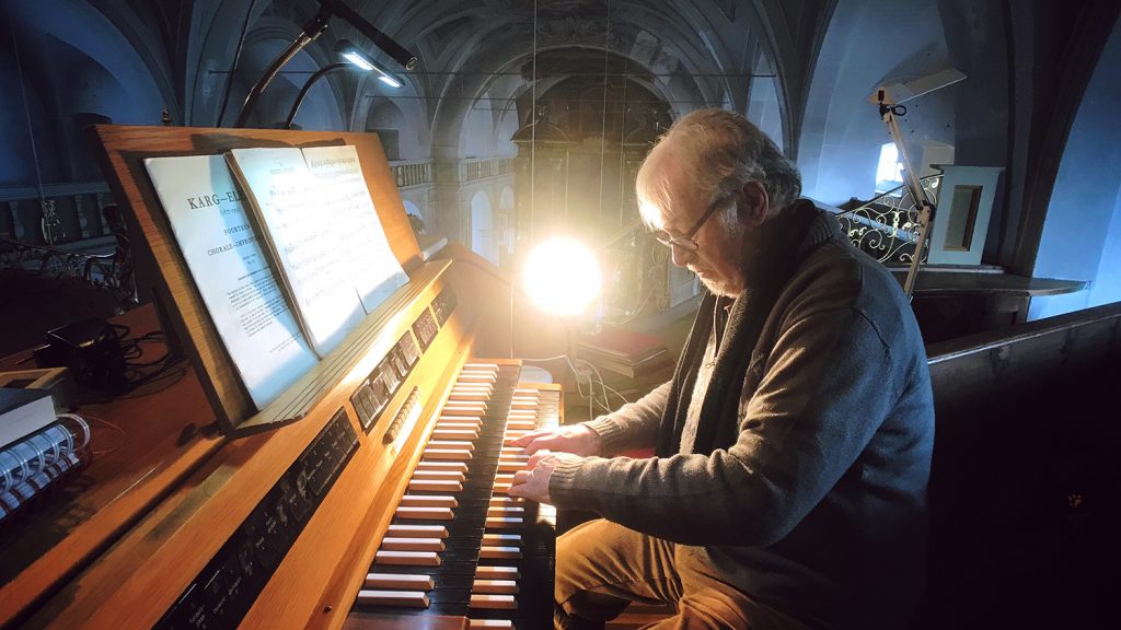 Organist playing in church