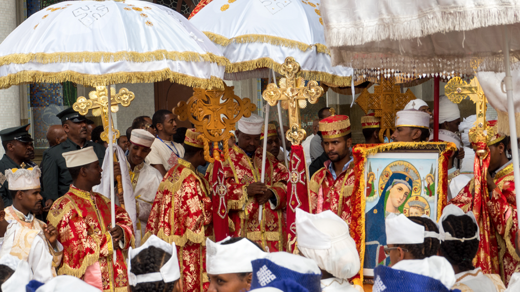 Orthodox priests showing painting of Saint Mary, during the 2015 Timkat ceremony